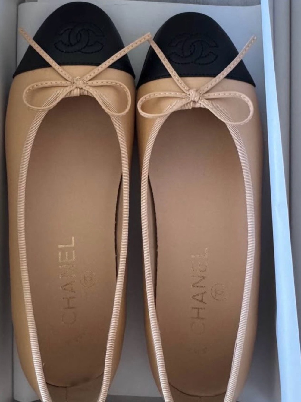 CHANEL Beige and Black Cap-Toe Ballet Flats